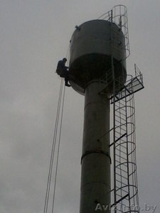 Покраска и сварка водонапорных башен методами промышленного альпинизма.